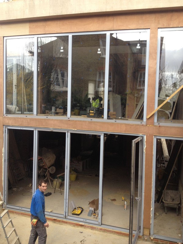 Aluminium bi-fold doors with two-storey glazing in Chelsea